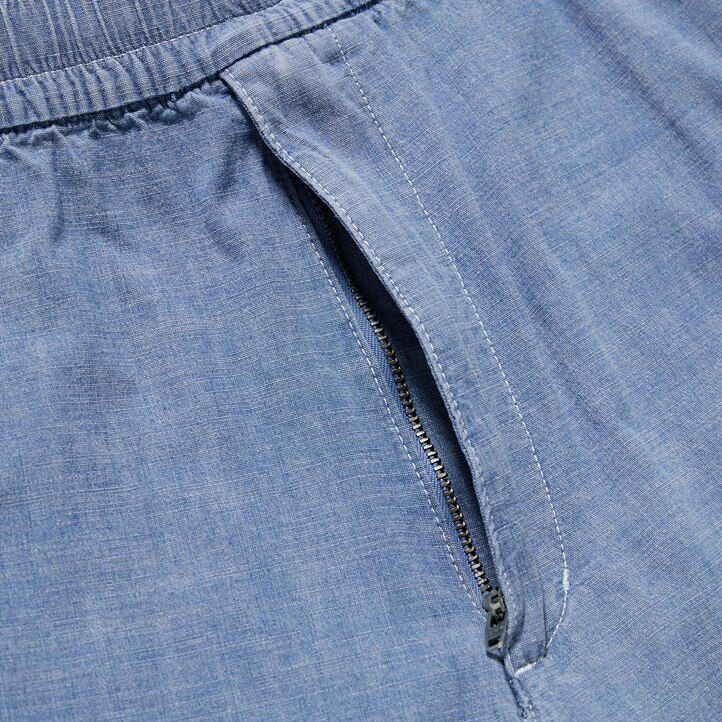 modré pánské strečové kalhoty uniqlo chambray easys