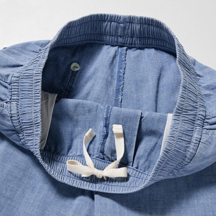 modré pánské strečové kalhoty uniqlo chambray easys