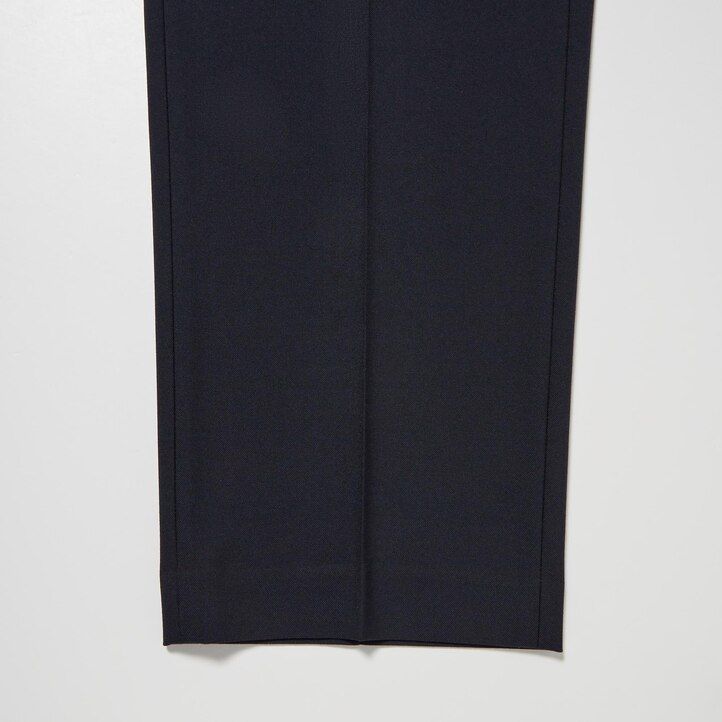pánské kalhoty uniqlo two way stretch s plisovaným zúženým střihem béžové barvy