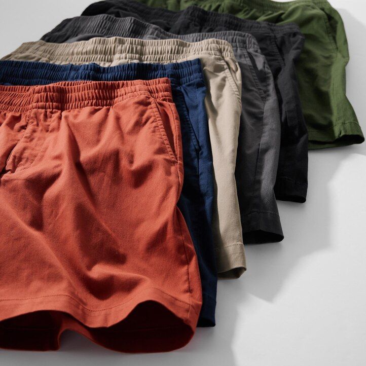 tmavě šedé pánské kalhoty uniqlo dry stretch easys