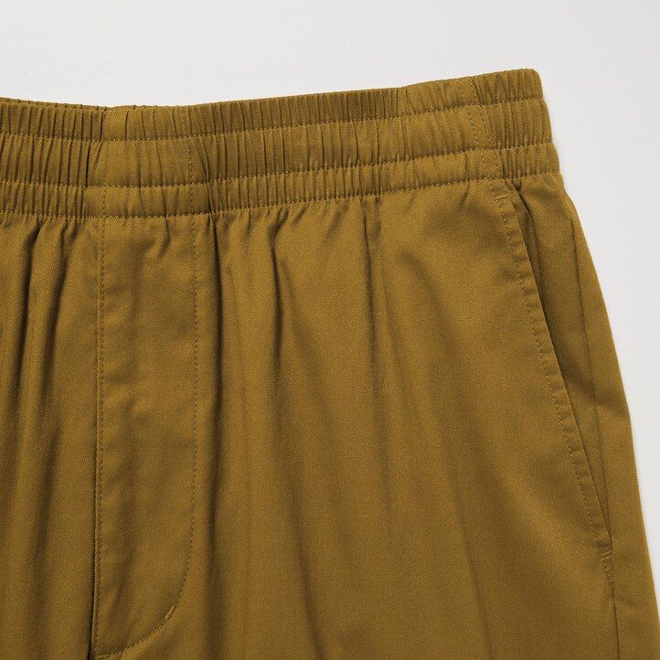 tmavě šedé pánské kalhoty uniqlo dry stretch easys
