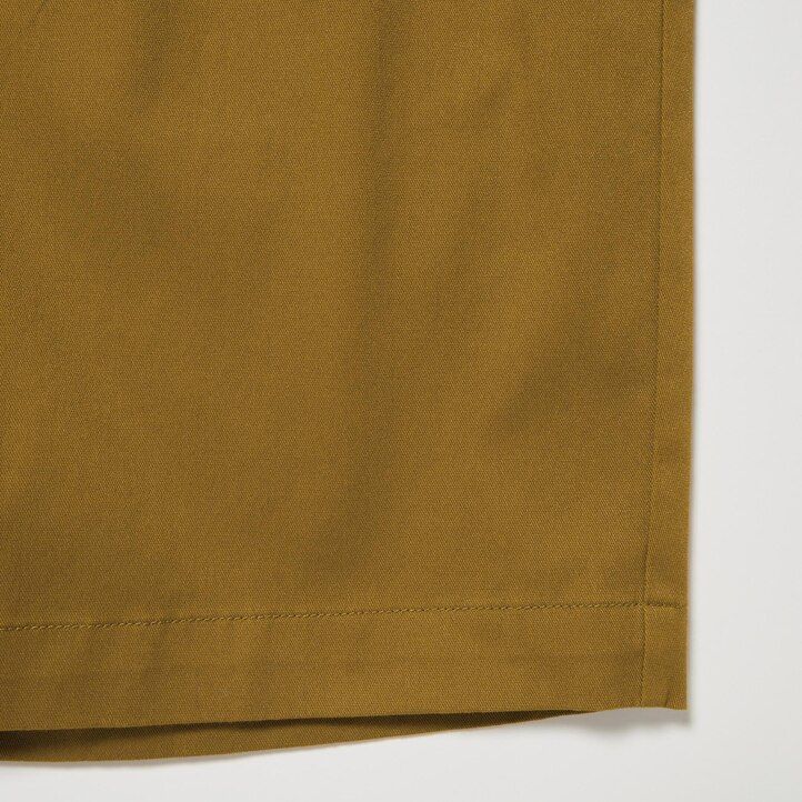 tmavě šedé pánské kalhoty uniqlo dry stretch easys
