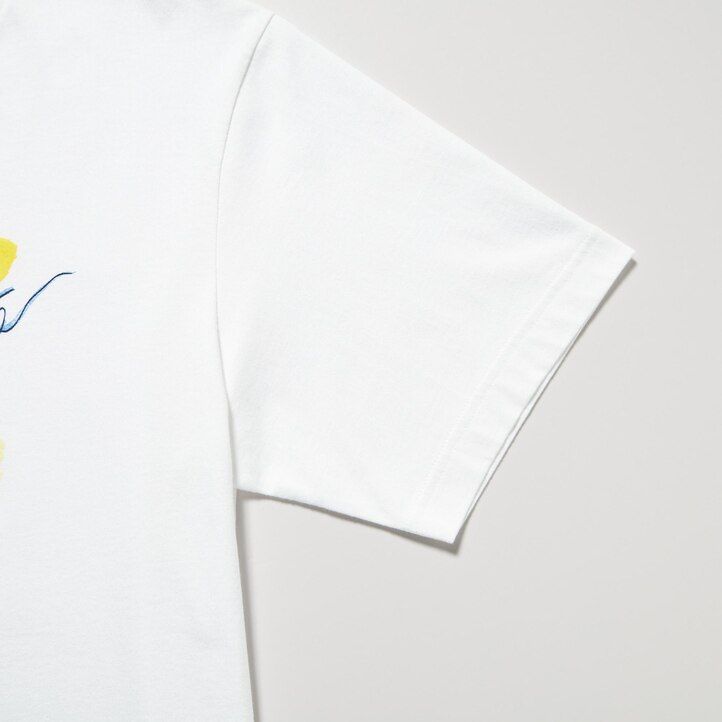 dámská bílá trička uniqlo peace for all s grafikou ines de la fressange