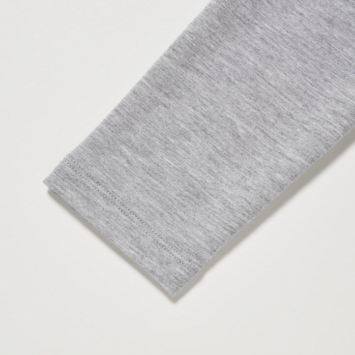 tmavě zelené dámské termo tričko uniqlo heattech extra warm cotton s kulatým výstřihem a rukávy